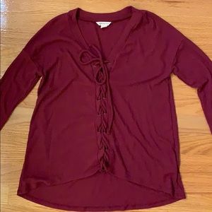 Long sleeve, lace up, v-neck tee